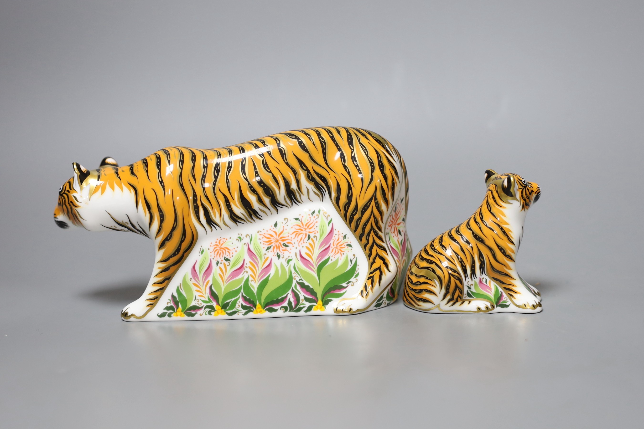 Two Royal Crown Derby paperweights - Sumatran Tigress, gold stopper, boxed with certificate and Sumatran Tiger Cub, gold stopper, boxed with certificate